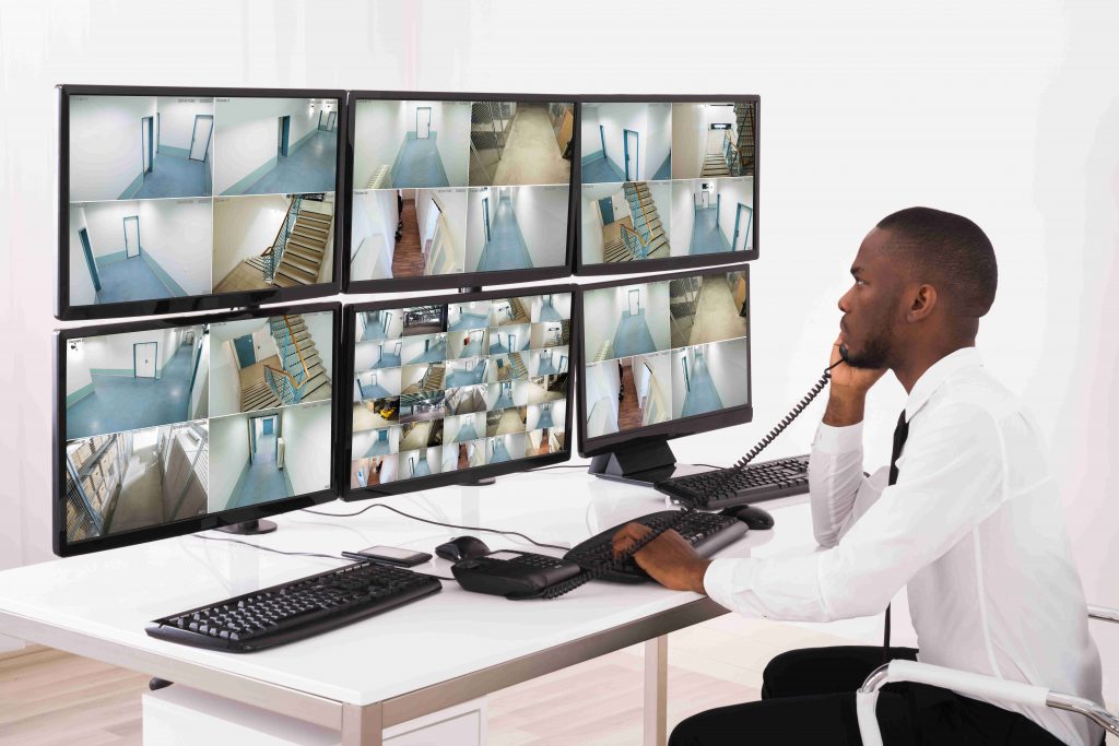 man-monitoring-on-phone
